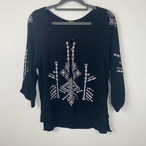Poof blouse color black with white embroidery